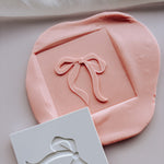 Floppy ribbon bow plate stamp