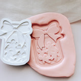 Gingerbread cookies in a jar with bow stamp and cutter