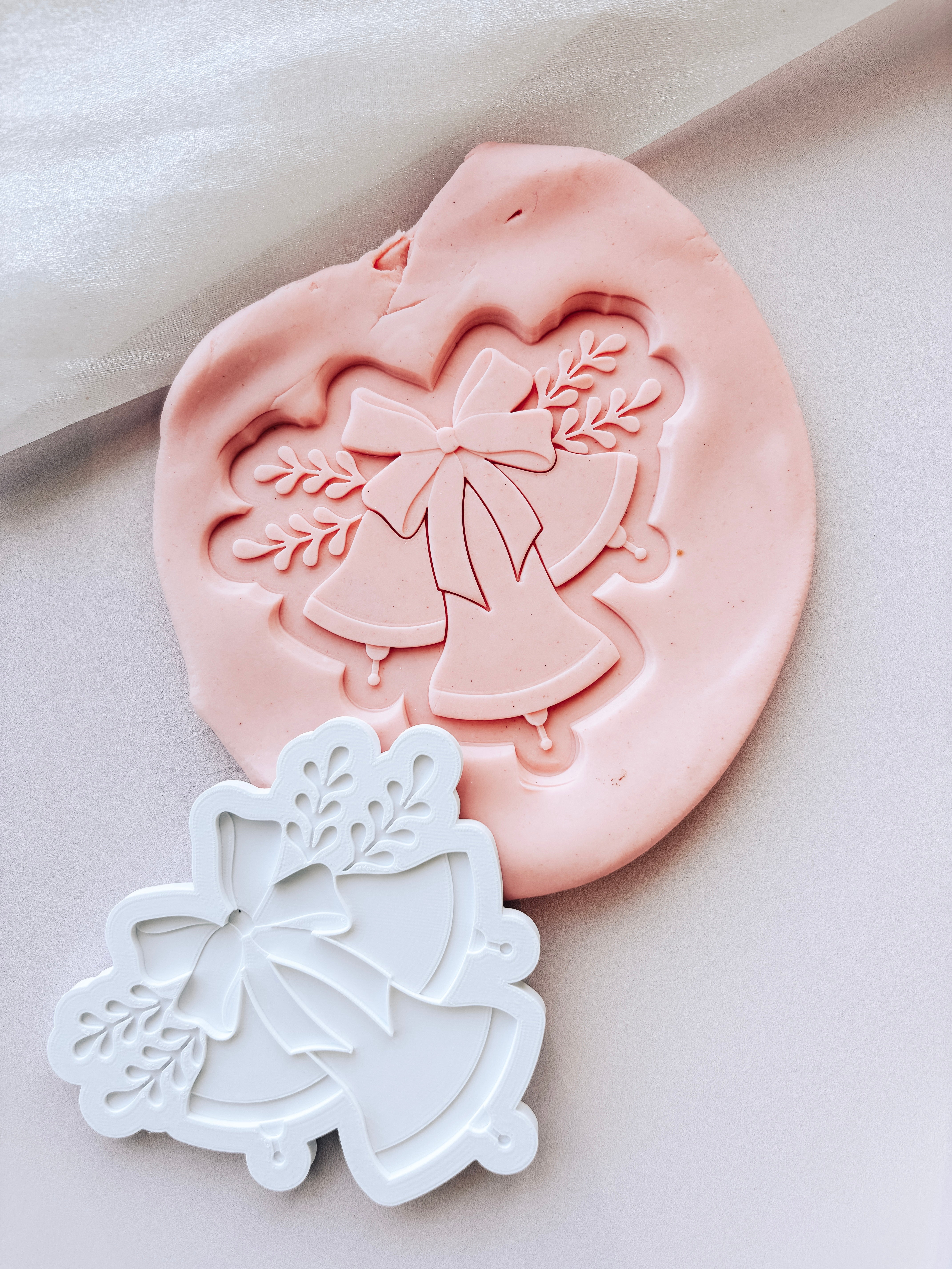 Christmas bell trio with ribbon and foliage stamp and cutter