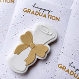 Graduation scroll stamp and cutter