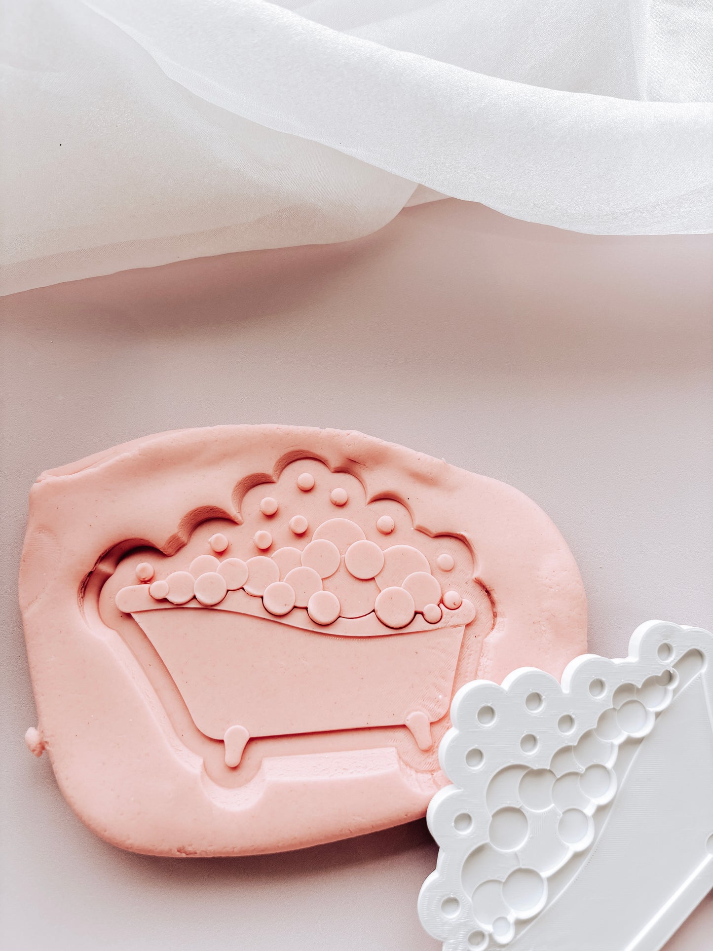 Bubble bath stamp and cutter