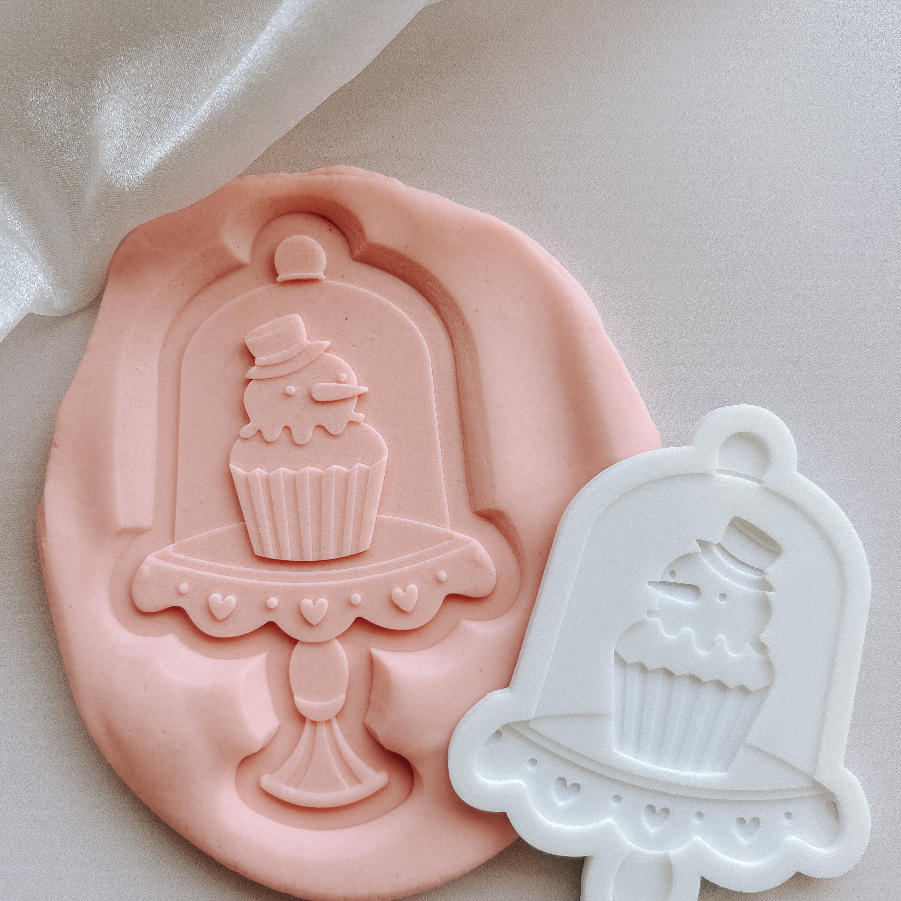 Snowman cupcake in glass display debosser and cutter