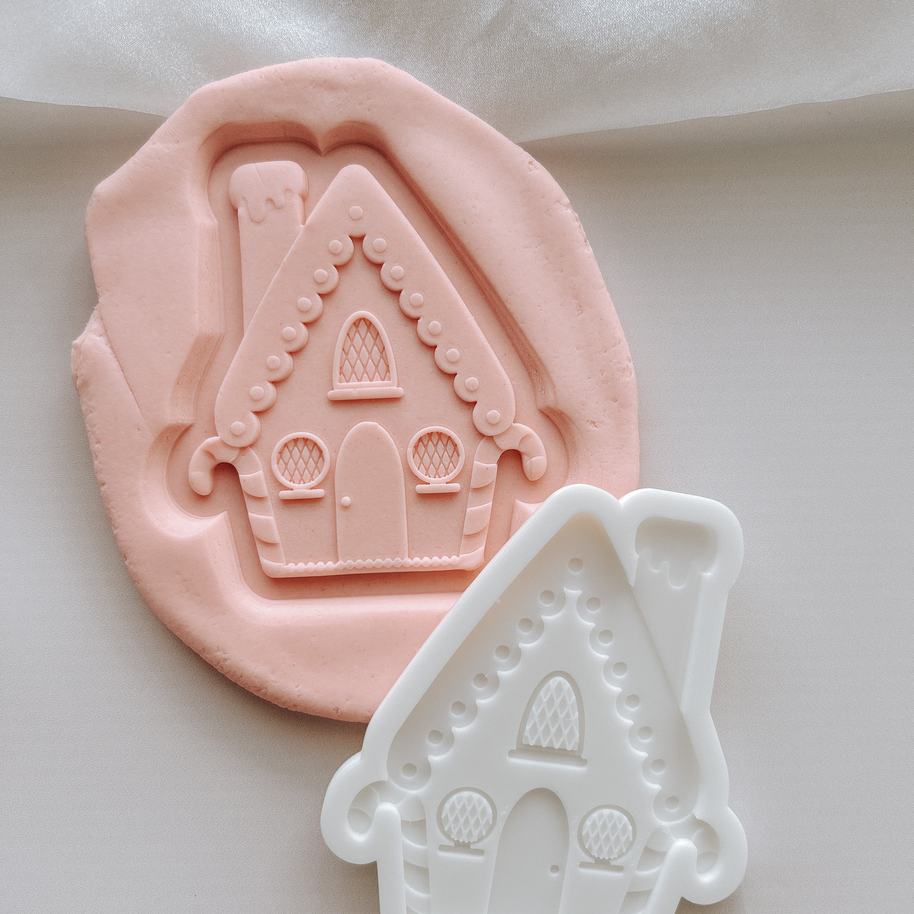 A frame gingerbread house debosser and cutter