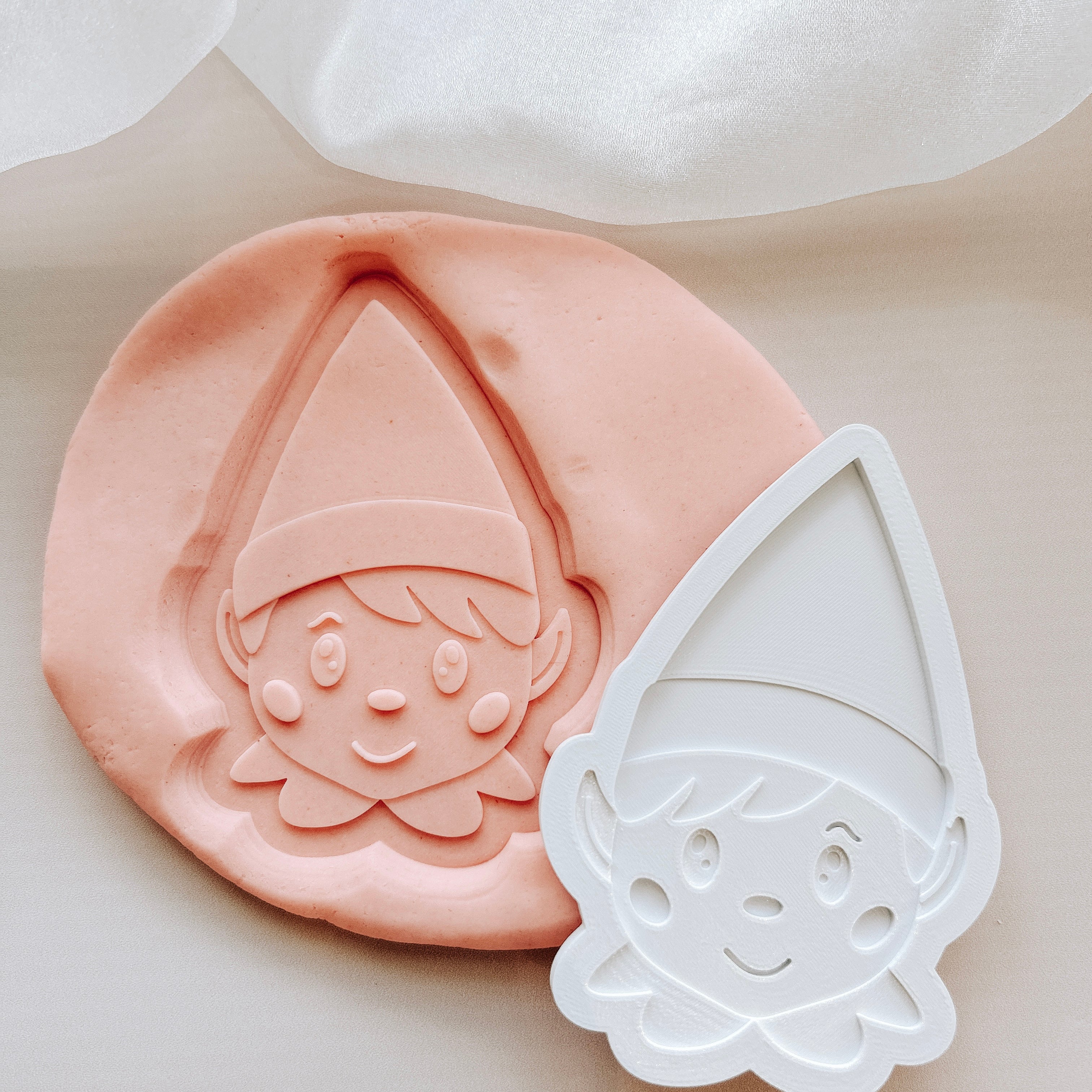 Elf head debosser and cutter