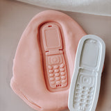 Flip phone stamp and cutter