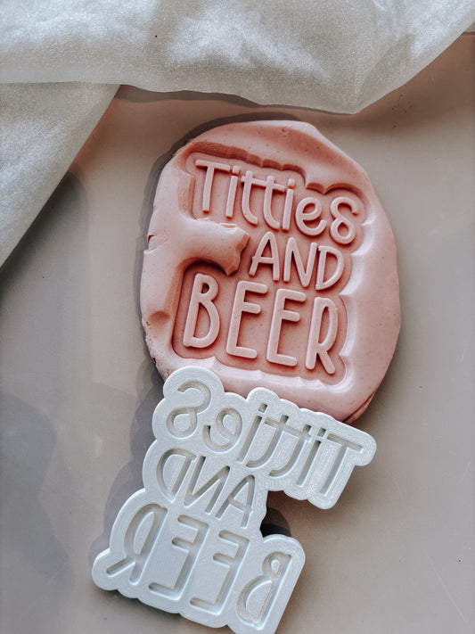 Titties and beer stamp and cutter