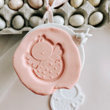 Excited chick with polka dotted egg debosser and cutter
