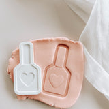 Nail polish with heart debosser and cutter