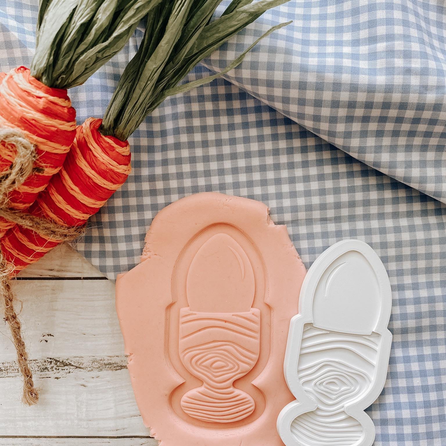 Egg in wooden holder stamp and cutter