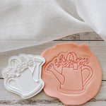 Watering can with florals stamp and cutter