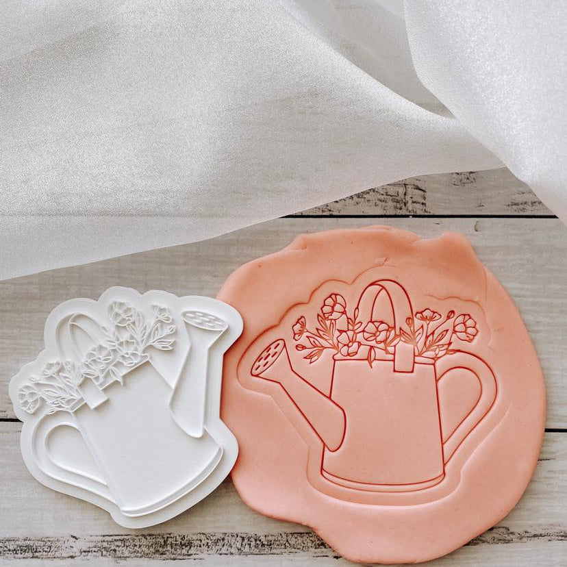 Watering can with florals stamp and cutter