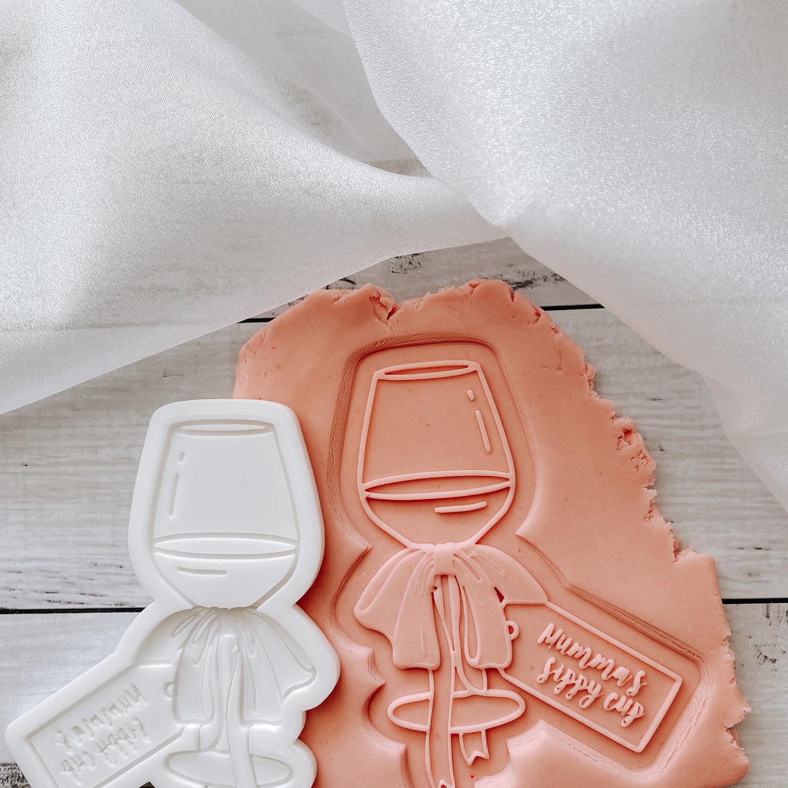Pair of Sippy Cups debossers and cutters