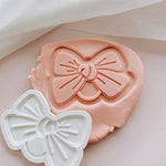 Baby hair tie stamp and cutter