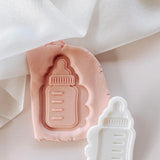 Baby bottle with room for embellishments debosser and cutter