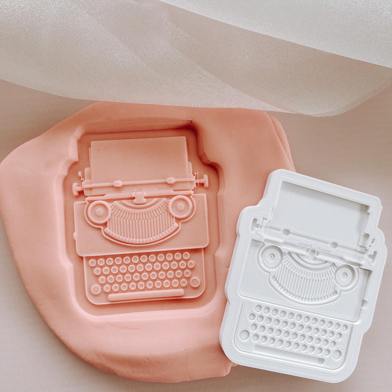 Type writer debosser and cutter