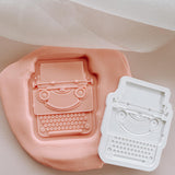 Type writer debosser and cutter