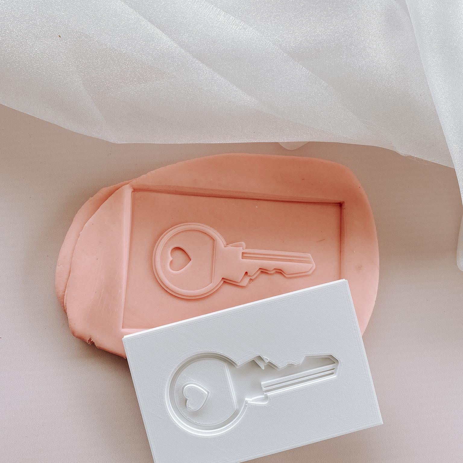 House key debosser