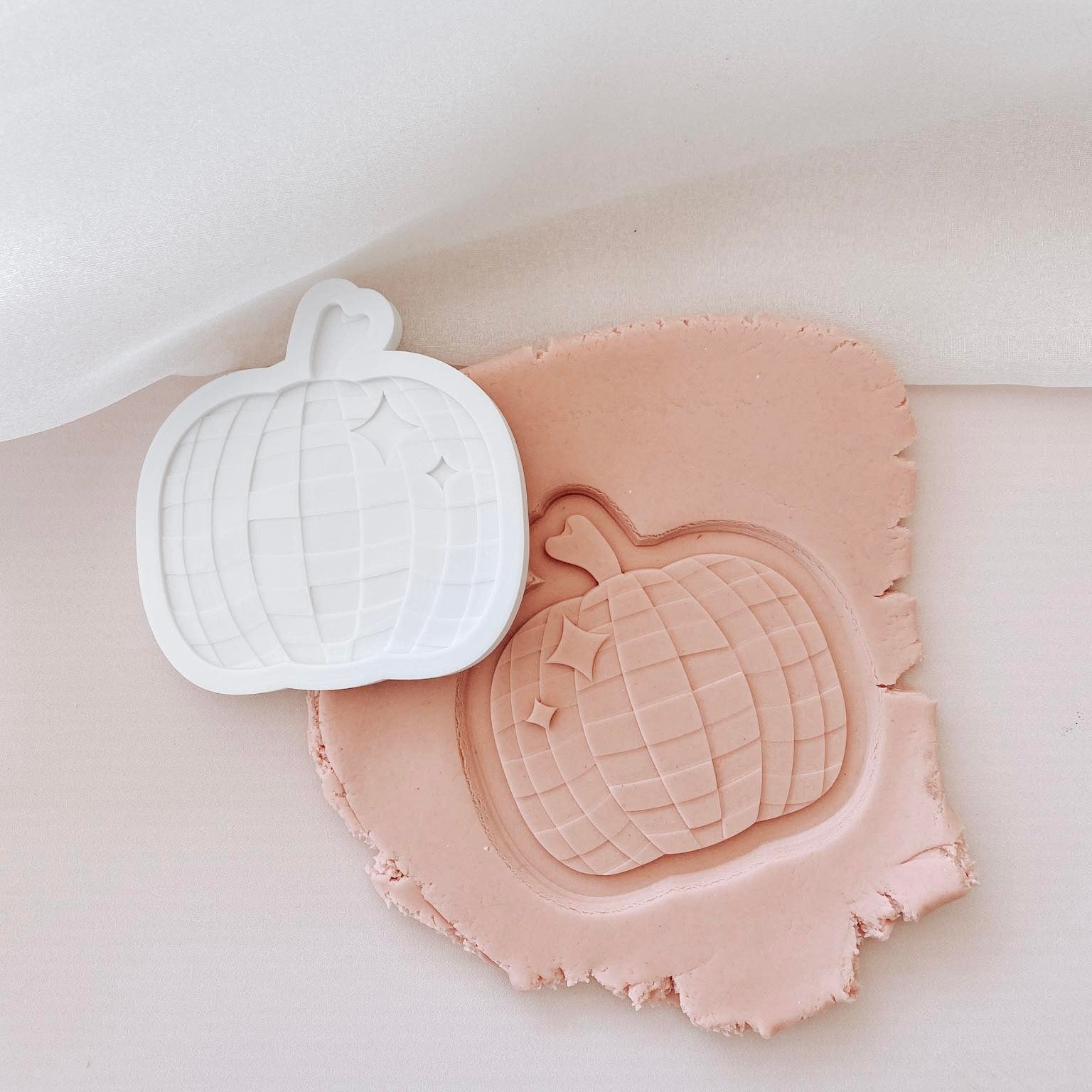 Disco ball pumpkin debosser and cutter