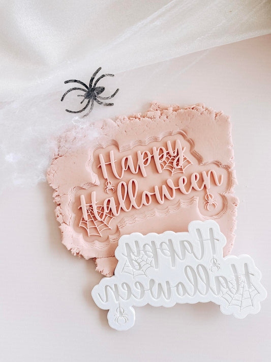 Webbed 'Happy Halloween' stamp and cutter