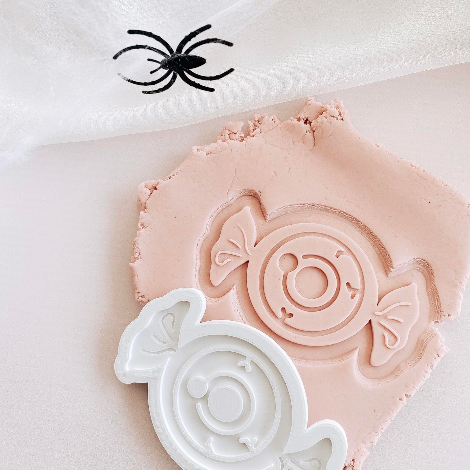 Eye candy in wrapper debosser and cutter