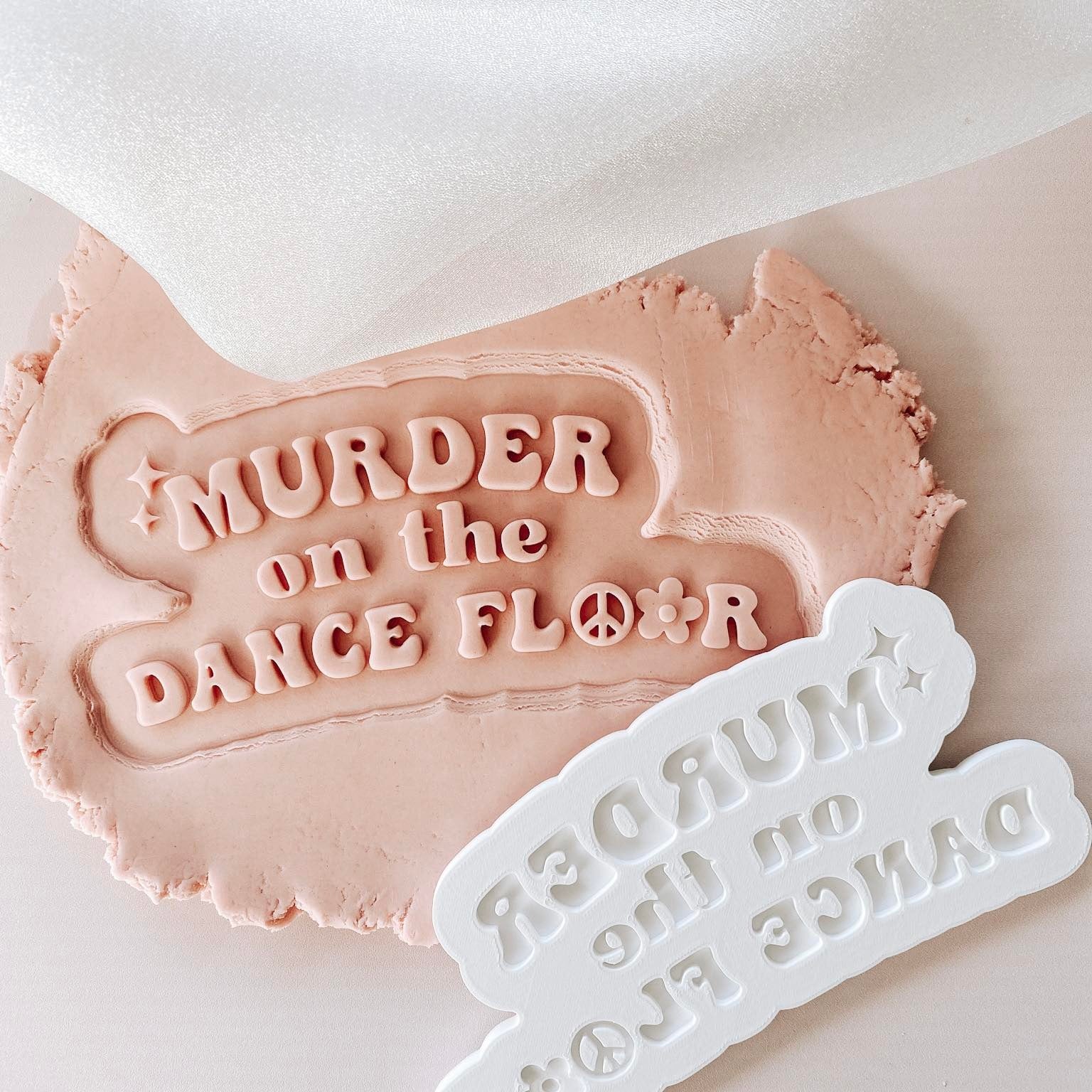 Murder on the dance floor debosser and cutter