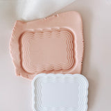 Stepped rectangular wavy border debosser and cutter