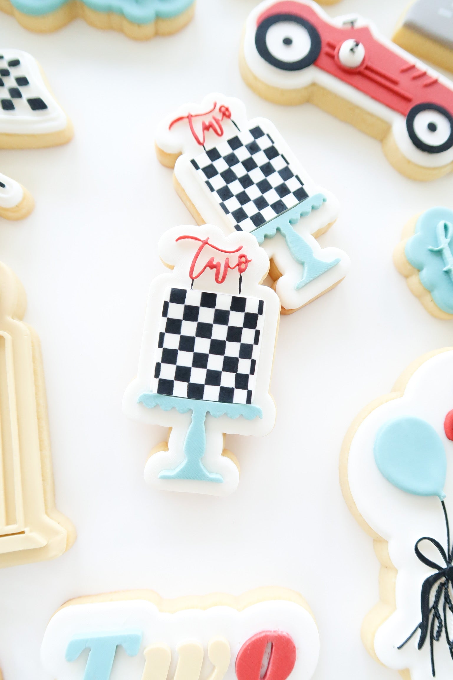 Cake with “number____” topper debosser and cutter
