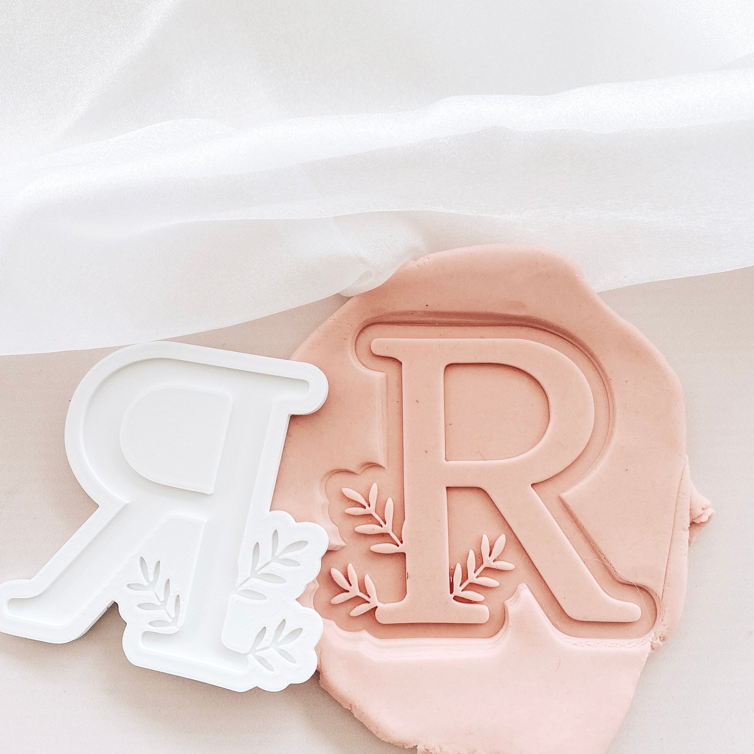 Single floral edged letter debosser and cutter