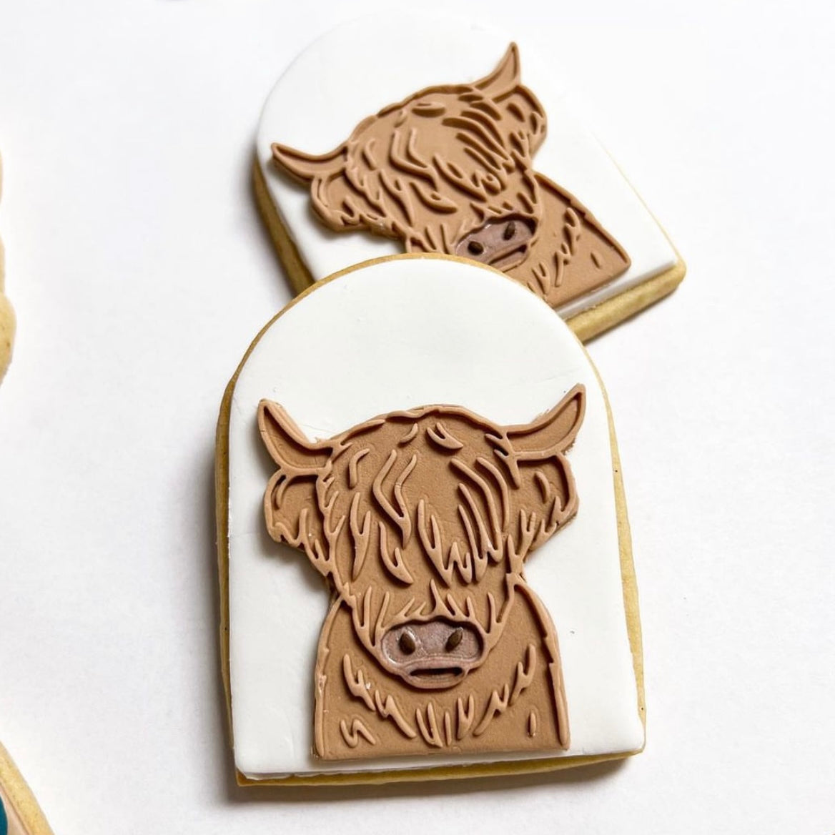 Highland cow in arch debosser and cutter