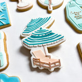 Poolside chair and umbrella debosser and cutter