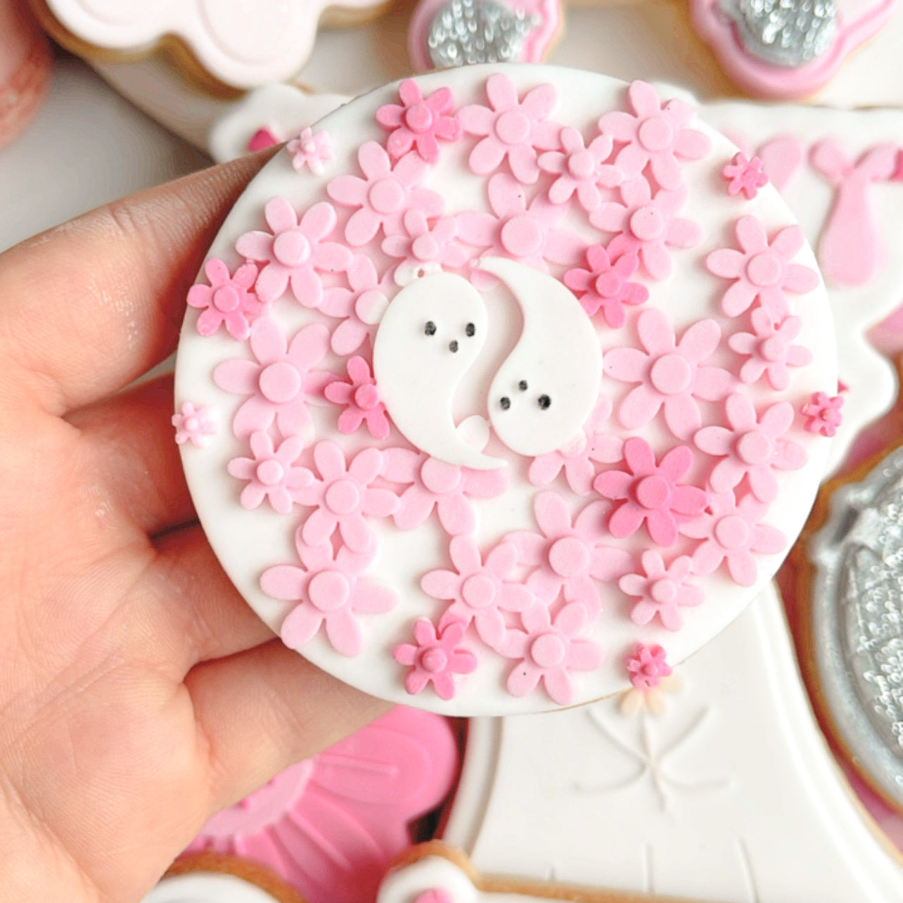 Ying Yang ghosts in a field of daisies debosser