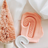Cursive “Christmas” candy cane stamp and cutter