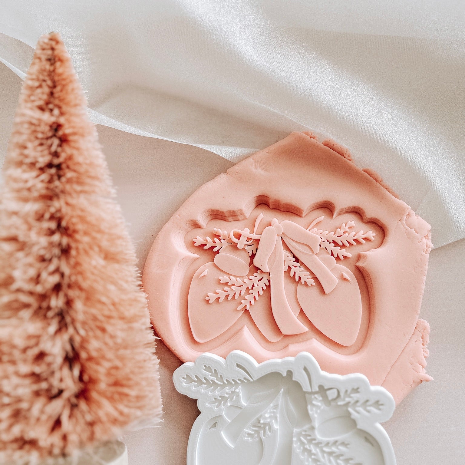 Trio of Christmas lights with bow and foliage stamp and cutter