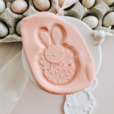 Easter chick with bunny ears in polka dotted egg debosser and cutter