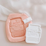 Typewriter stamp and cutter with matching embosser set
