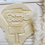 Drive in sign cookie embosser and cutter